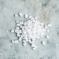 meringue granules on a grey marble table top