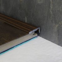 Trojan Walnut Angle Edge Self adhesive 25x8mm 2.7 Metre A31