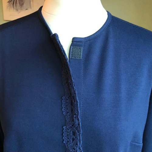 The Annabelle Cardigan has easy close velcro with gold button detail at the front.