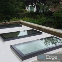 two rectangle sky edge roof windows on a flat roof