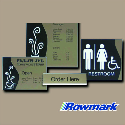 Engraved Rowmark satin plastic signs including coffee shop and restroom signage