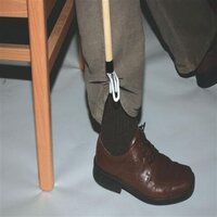 Wooden handle dressing stick with a large dressing hook.