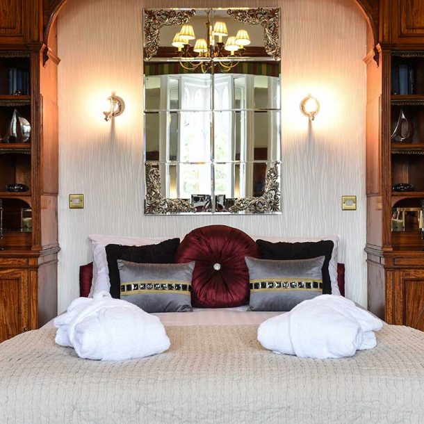 Hotel Bedroom with Folded Robes