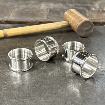 Set Of Four Pewter Napkin Rings