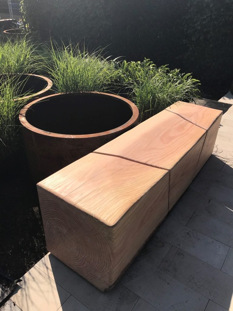 douglas fir bench with plant pots