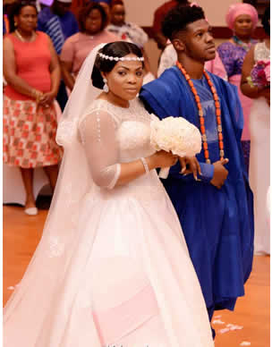 Boy-walks-mum-down-the-aisle