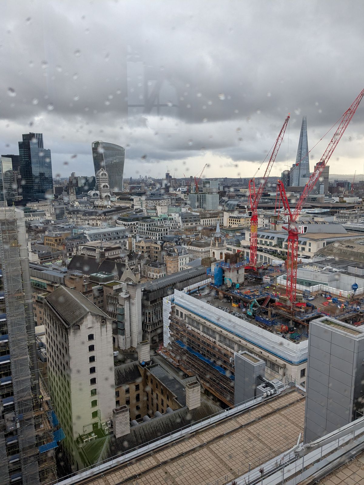 City in rain — watching over London