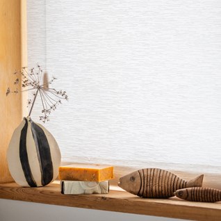 Natural roller blind fabrics to add warmth to your home