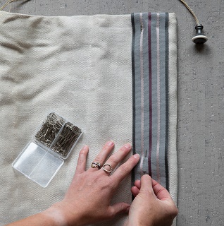 adding woven trim or a braid to a curtain