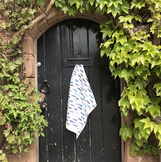 against the flow blue and white tea towel against the flow blue and white tea towel