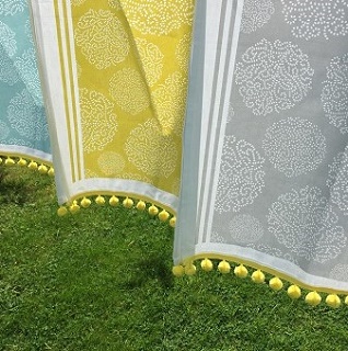 asha tea towels with yellow pompoms asha tea towels with yellow pompoms