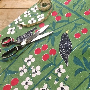 cherry orchard cotton fabric in green