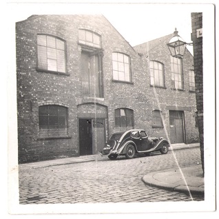 new riley outside H. Stanier & co