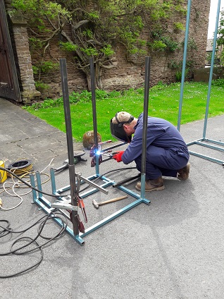 john working on wider table frame