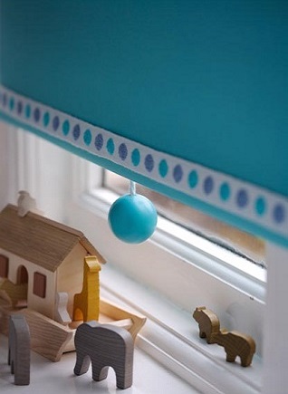 spot braid and turquoise pull on a window blind
