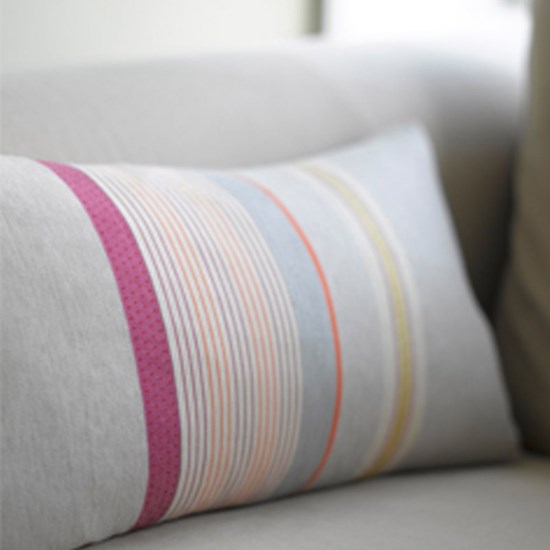 luxury striped woven cushion by Laura Fletcher in orange red ochre pink and grey wool and cotto luxury striped woven cushion by Laura Fletcher in orange red ochre pink and grey wool and cotto