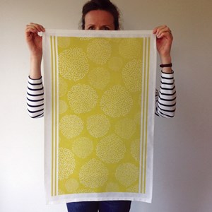 asha contemporary british tea towel design in gooseberry green  by melanie darwin asha tea towel - gooseberry green