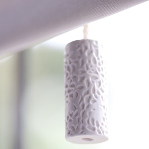 white elegant beautiful porcia english bone china blind pull with interesting patterened surface tex porcia bone china blind pull