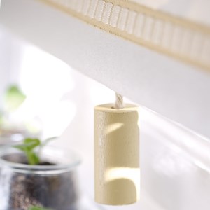 wheat colour spinone cylinder quality interior window roller blind pull in painted natural beech woo spinone blind pull -  wheat