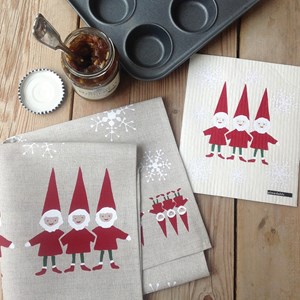 nordic elves tea towel and washing up cloth gift set, featuring santas helpers and snowflakes in red nordic elves tea towel & cloth gift set