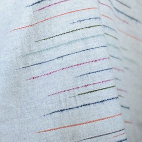 Chalkney stripe throw Soft Grey slub effect striped woven throw by Laura Fletcher in multi colour on soft grey ground