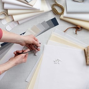 white natural cotton Swedish roller blind fabric is a traditional window dressing