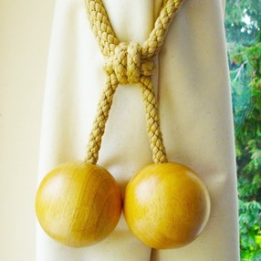 wooden curtain tieback in waxed wood