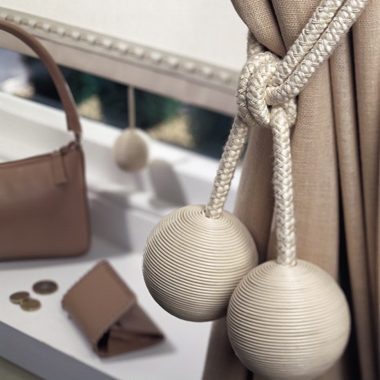 cream leather ball curtain tieback or hold-back