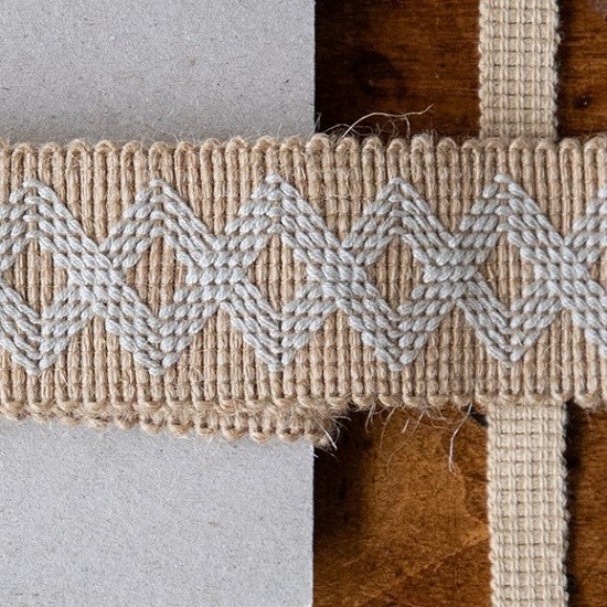 zigzag braid decorative trim with pattern stitched in natural cotton with jute background geometric jute trim