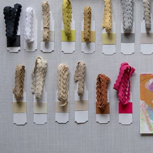 arco in lichen colour is a simple wavy curvy decorative trimming or braid arco braid - lichen