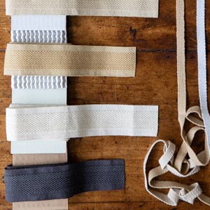 decorative trimming braid in subtle wool/cotton weave in pecan cream colour carpet trim - pecan