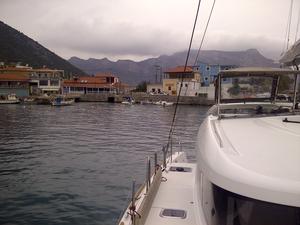 Plaka Leonidio - Nice and protect port.  Use the quay to anchor by side at the easy months or by stern on busy months. Use the anchor. Depth is 4 to 5 meters at quay. No mooring lines. At the port there are a mini market some tavernas and two bars.  Water and power is available.  Port police some times want to check yacht papers and passports. Verry interesting is the vilage Leonidion.   Take a taxi (4 Persons) from port. Tarif is 6 euro and take about 10 minutes from port to vilage. Super market, greengrocer  shop, bucher, coffe shops, tavernas, are available in the vilage. Use taverna  MITROPOLIS in the vilage. Excellent Greek traditional food or meat on the grill. Good service and very low prices.  Take your coffe in the main street under the orange trees. 