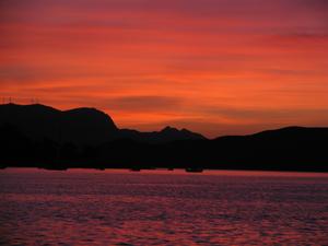 Poros - Sunset overlooking the bay of Poros island