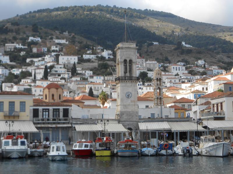 Hydra - Historic and cosmopolitan island two hours away from Athens by the hydrofoils. On the island there are no cars and the movements performed only by mules and horses. The harbor is very small and receives a large number of sailing and motor yachts daily. Sometimes by the two opposite pontoons boats are tied up in two or three rows, and the result is the anchor to be involved at the bottom.  If no space in the harbor use the anchorage Mandraki half sea mile north from the main port. Use a sea taxi for a delivery to the town or by walking is about 20 minutes. Walk the small narrow streets and in the hinterland you will find restaurants and bars for all tastes. Expensive island but if you search, you will find good and cheap prices for food. Use the tavern XERI ELIA (Ntouskos). Good food in logical prices located in a beautiful square under trees.