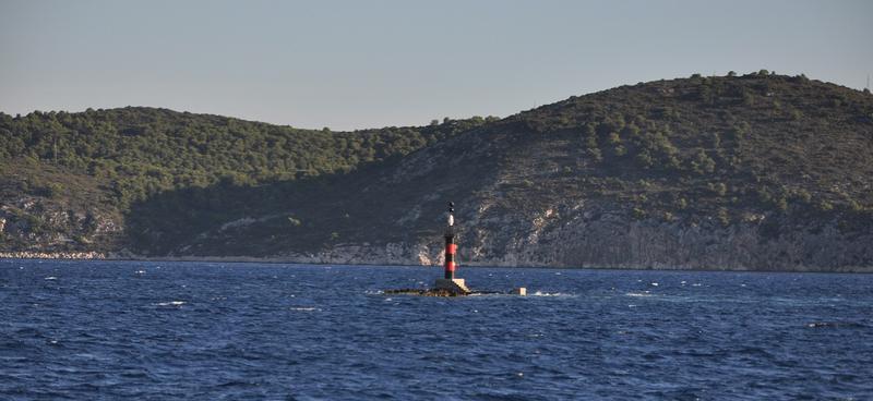Rock in front of the marina Palmiżana