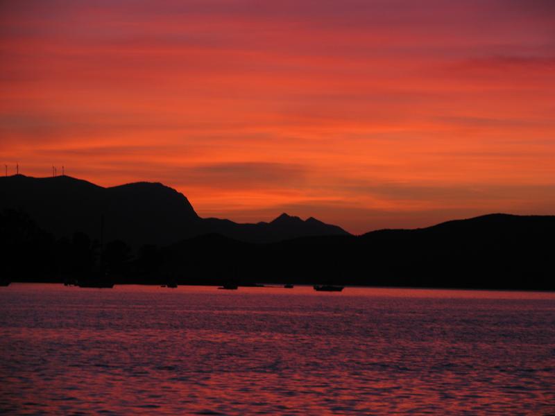 Poros - Sunset overlooking the bay of Poros island