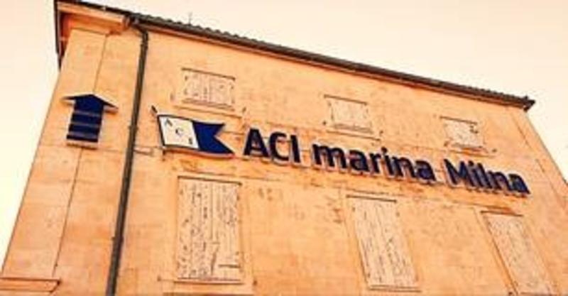 ACI Marina Milna - A big stone house marks the beginning of ACI marina, Before is a different marina.