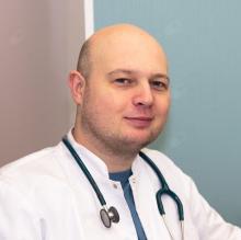 Powiększ obraz: Michał Tomaszewski, pediatra Kraków