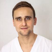 Powiększ obraz: Bartosz Bomba, fizjoterapeuta Wrocław