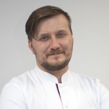 Powiększ obraz: Tomasz Woźniak, ortopeda Poznań