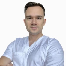 Powiększ obraz: Tomasz Dawidowicz, stomatolog Warszawa