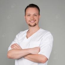 Powiększ obraz: Piotr Gutowski, chirurg stomatologiczny Warszawa