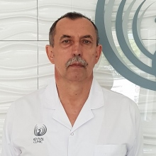 Powiększ obraz: Adam Macech, chirurg Warszawa